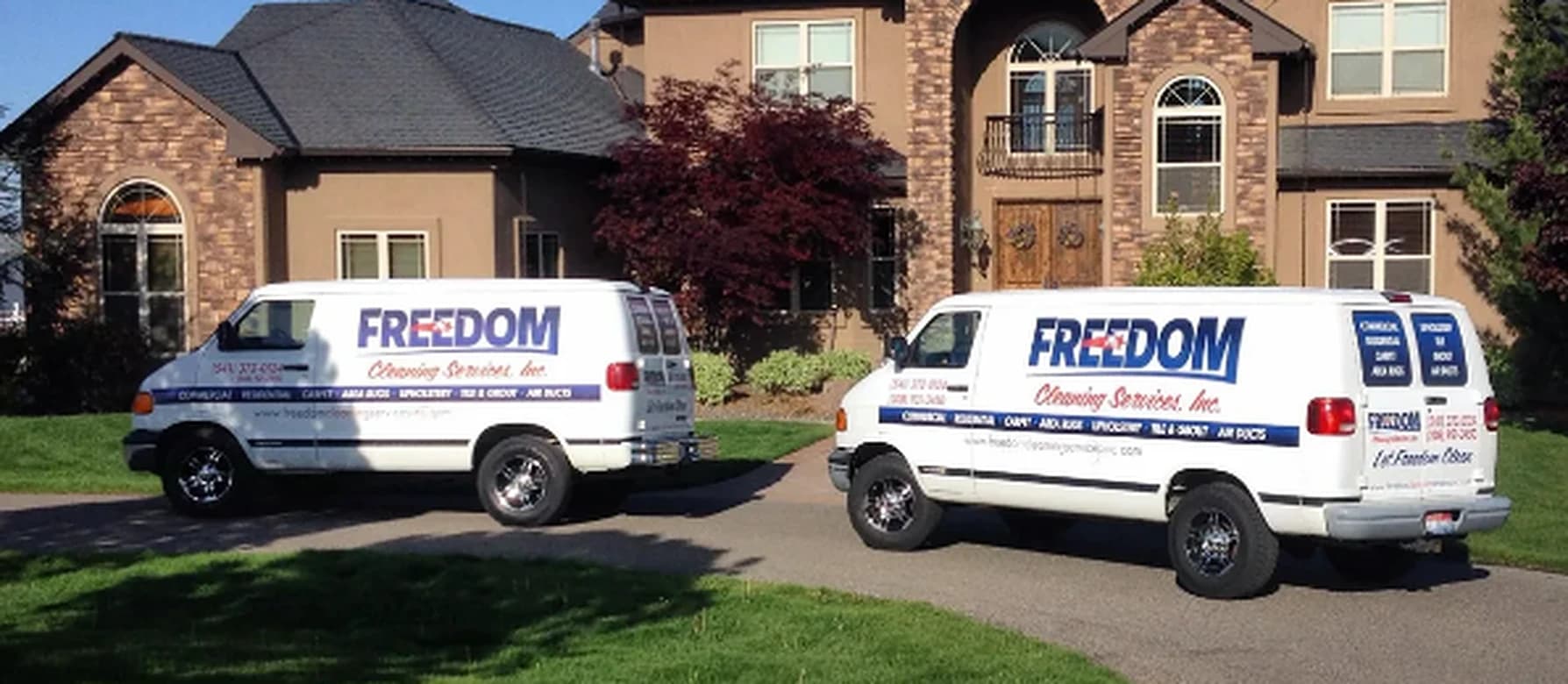 A Freedom Cleaning technician deep-cleaning a carpet