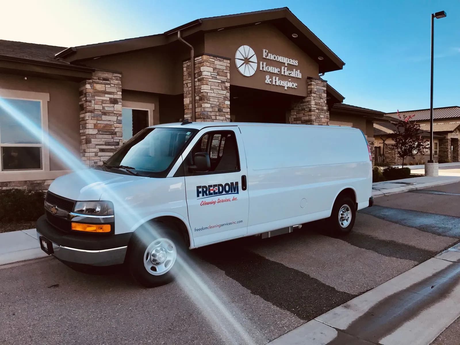 The Freedom Cleaning Services branded van